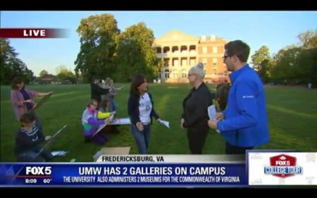 Image shows students sketching while news anchors interview UMW professor