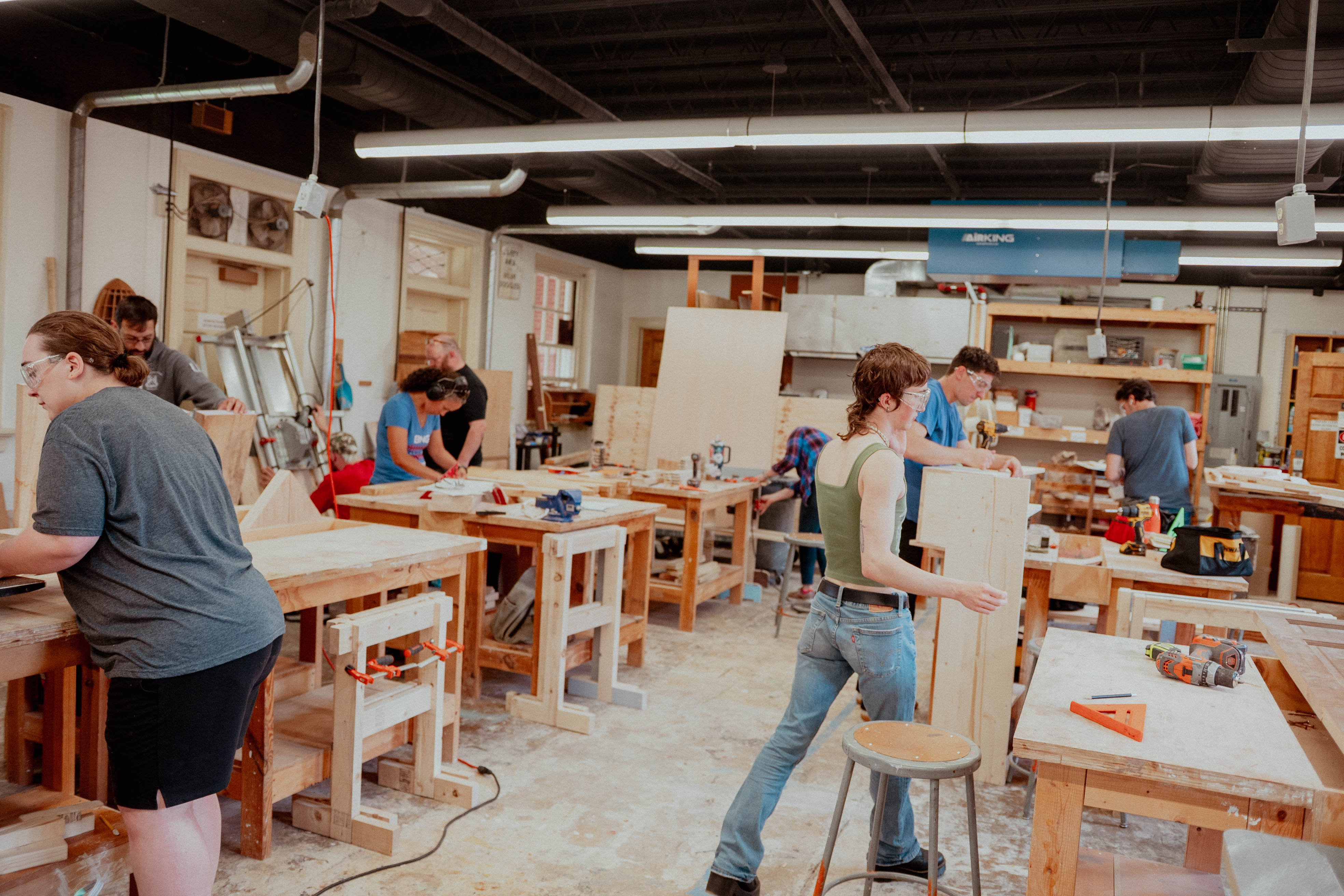 students in a wood workshop