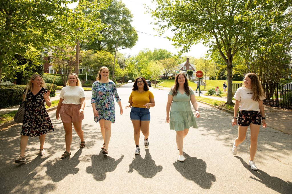 5 members of Psychology Research Team walking outside