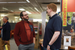 Attendees sitting at the RCC Open house