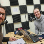 Professor and student in the recording studio with headphones and microphones