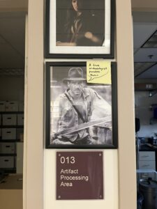 Photo of Indiana Jones hanging on the wall in the archeology lab