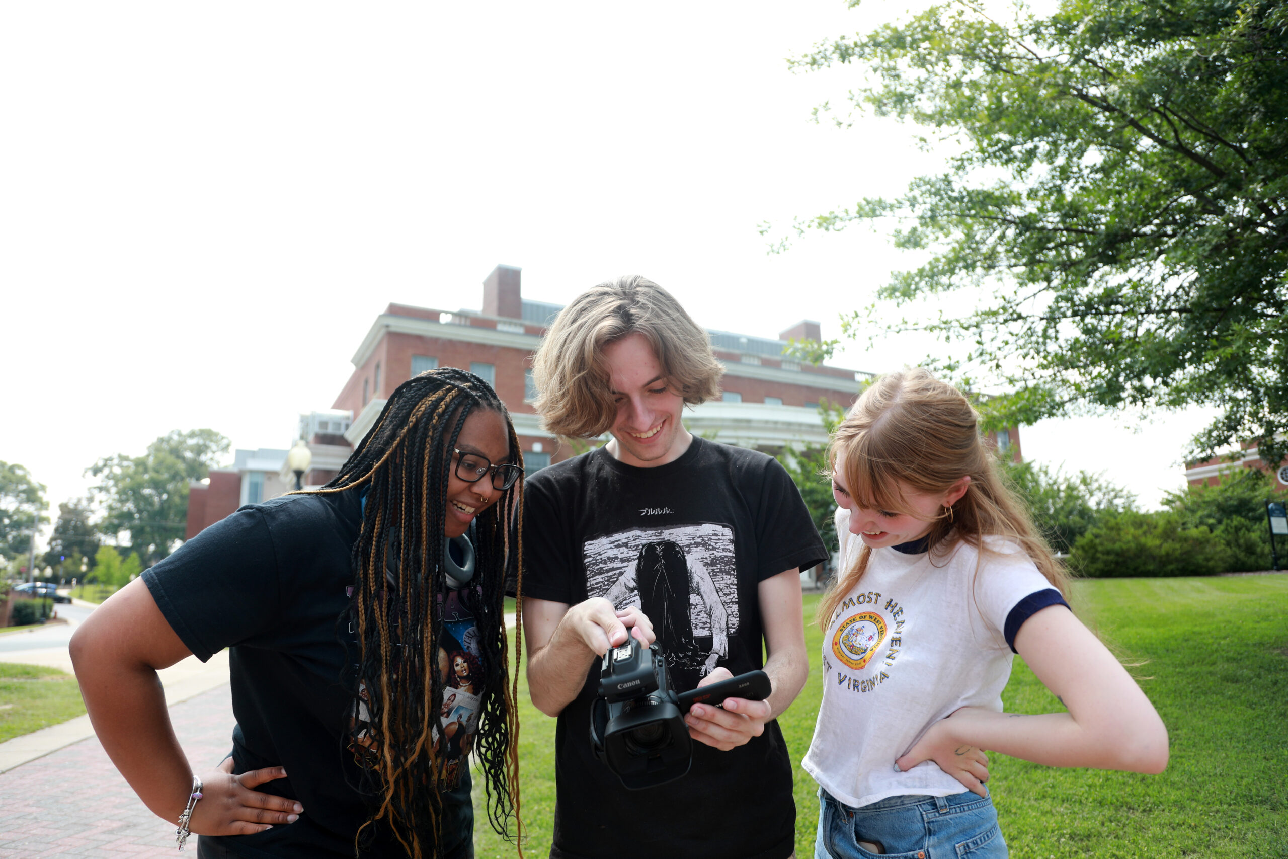 A group of students looking at a camera