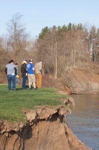 Students examine landforms and sediments on glacial geomorphology field trip.