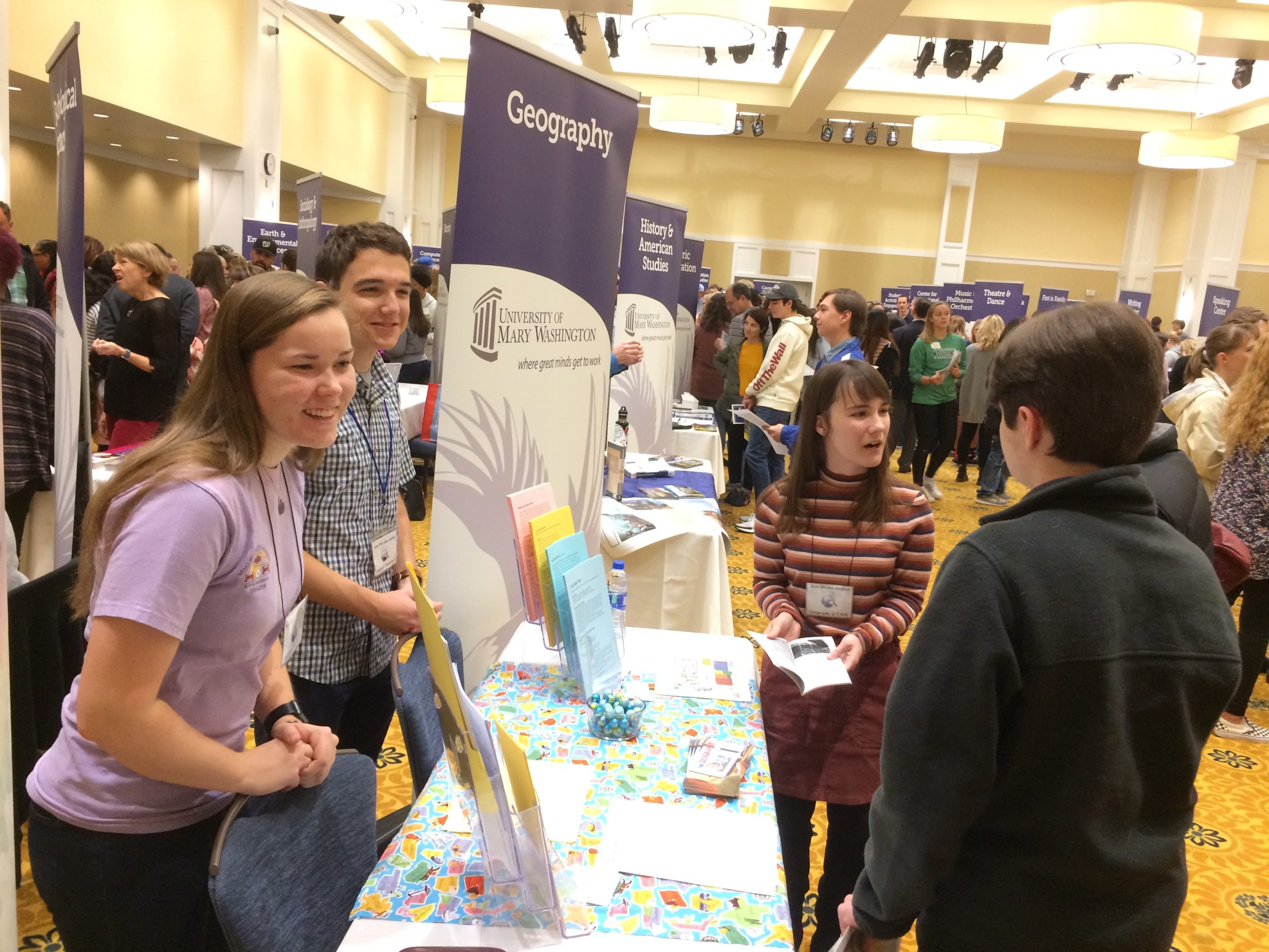 Geography majors hosting our table at an Open House event, fall 2019