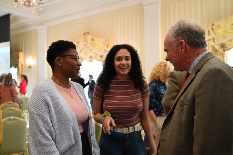 Students who worked on Civil Rights Trail story map speak with Senator Tim Kaine