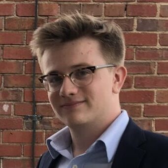 (Left to Right) Elisa, Dr. Nicholas, and Anders outside