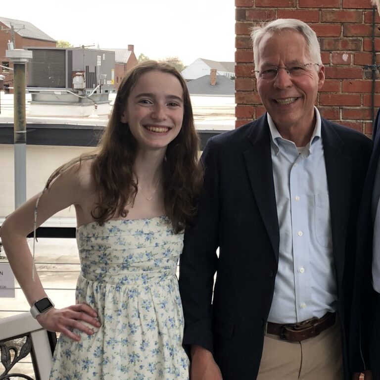 (Left to Right) Elisa, Dr. Nicholas, and Anders outside
