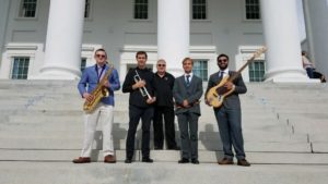 Professor Doug Gately with four members of the UMW Jazz Combo on the steps of the Virginia State House