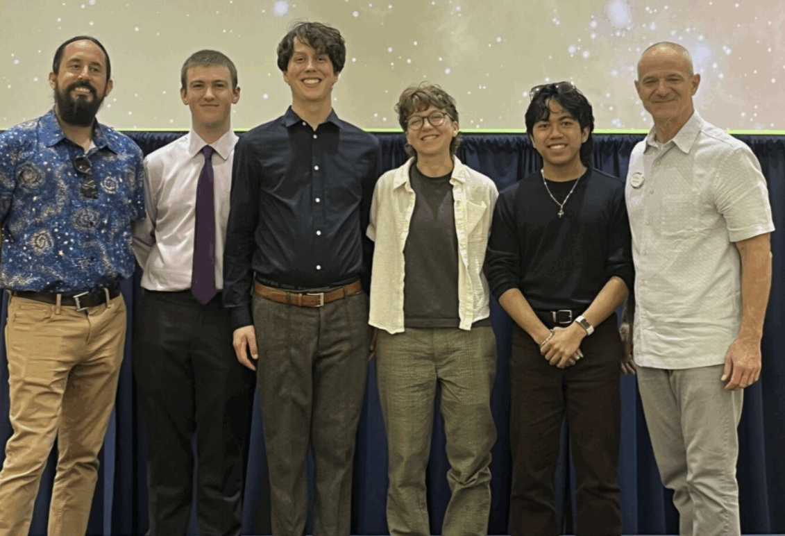 SSI 25 students and faculty at symposium.