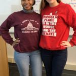 Khaila Nelson and Lauren Talbert together wearing matching t-shirts (different designs but same words).