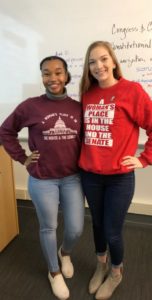 Khaila Nelson and Lauren Talbert together wearing matching t-shirts (different designs but same words).