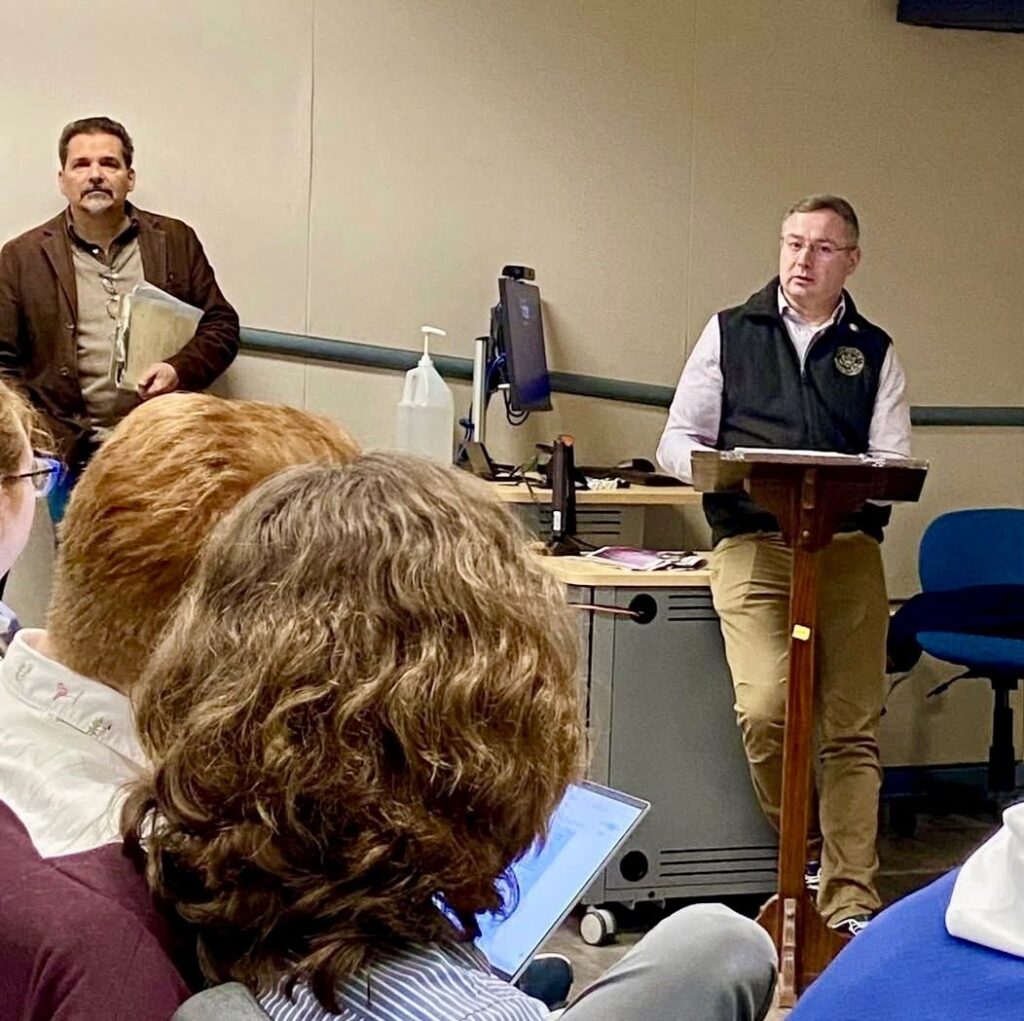 Representative Vindman (on the right) speaks to students