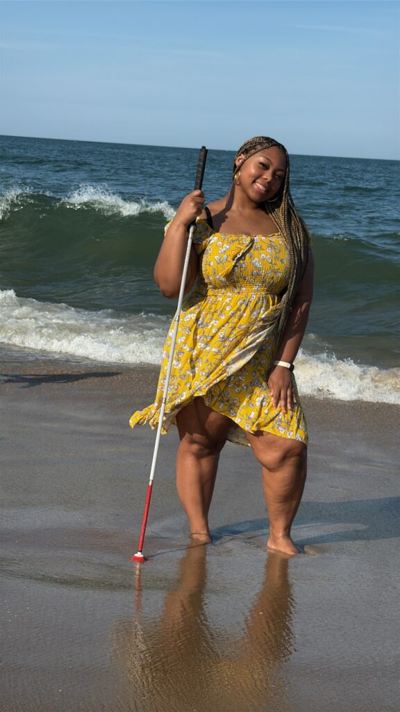 Destiny Ward standing on beach.